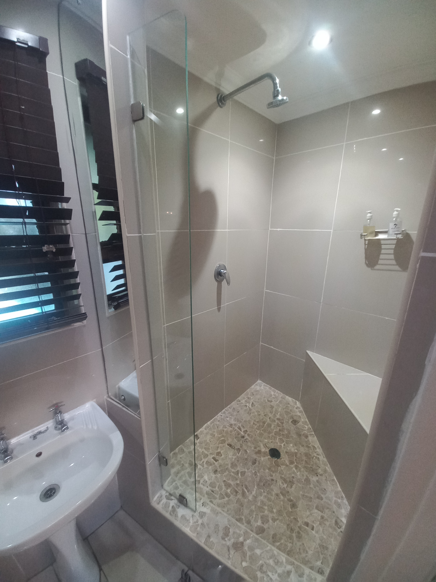 Mirelli en-suite bathroom with walk-in shower.